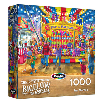 The image shows a ROSEART - BIGELOW COUNTRY - FAIR GAMES 1000 piece jigsaw puzzle box, featuring a colorful fairground scene with people enjoying games and attractions.