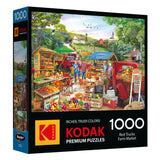 ROSEART KODAK PREMIUM Red Trucks Farm Market 1000 piece jigsaw puzzle features a vibrant outdoor market scene with red trucks, fresh produce, and shoppers.