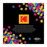 Colorful puzzle pieces surround a black square with the Kodak logo, highlighting the ROSEART - KODAK PREMIUM - THE BAKERY 1000 Piece Jigsaw Puzzle—a delightful puzzle for all ages.