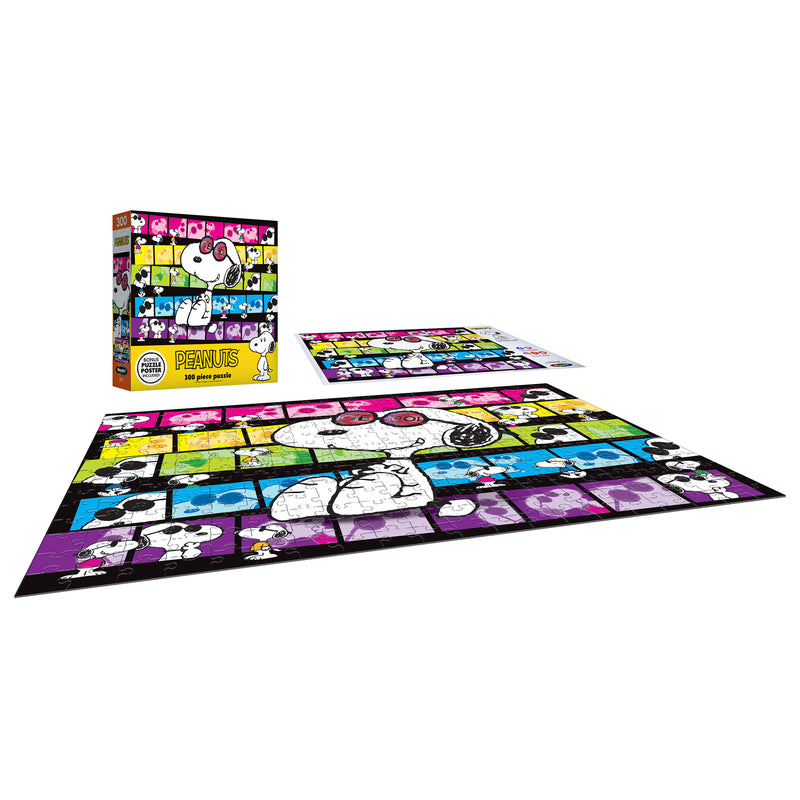 A colorful 300-piece jigsaw puzzle featuring various images of Snoopy from Peanuts. The puzzle is fully assembled on a surface, with the box placed next to it in the background.
