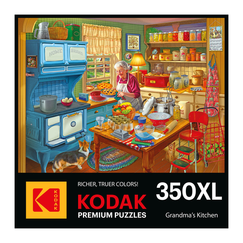 The puzzle box cover features a vintage kitchen with an elderly woman baking amid colorful dishes and a blue stove, while a cat observes. Text reads "RoseArt - KODAK Premium - Grandma's Kitchen - 350 Piece Jigsaw Puzzle.
