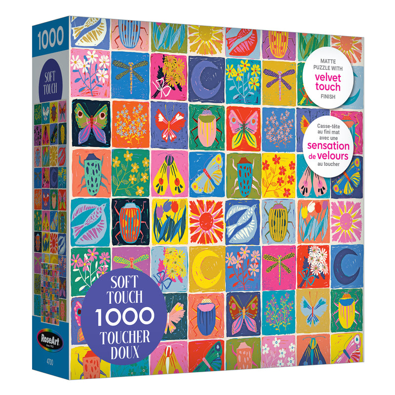 The ROSEART-SOFT TOUCH-SUMMER QUILT-1000 PIECE JIGSAW PUZZLE features vibrant insects and flowers in a grid, reminiscent of a summer quilt, and boasts a soft velvet touch finish for an enjoyable puzzling experience.