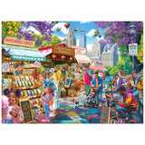 Experience the vibrant City Street Fair scene—vendors, art, lively crowds, and city skyscrapers—in the ROSEART-KODAK PREMIUM-CITY STREET FAIR-1000 PIECE JIGSAW PUZZLE.