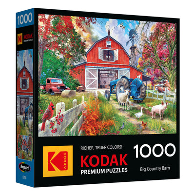 The ROSEART-KODAK PREMIUM-BIG COUNTRY BARN 1000 piece jigsaw puzzle features a charming farm scene with animals on its puzzle box.
