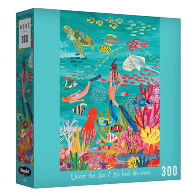 The ROSEART-HEBE STUDIOS "Under the Sea" 300 piece jigsaw puzzle features a vibrant underwater scene with sea creatures, coral, and two divers.