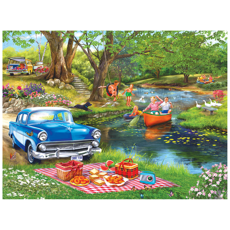 Families boat, tube, and picnic by a river while ducks swim and a classic car and camper add charm—captured in the ROSEART-BIGELOW ILLUSTRATIONS-GOOD TIMES AT THE RIVER-500 PIECE JIGSAW PUZZLE.