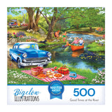 A blue vintage car is parked by a river where people canoe, swim, and fish beside a picnic on a red-checkered blanket in the ROSEART-BIGELOW ILLUSTRATIONS-GOOD TIMES AT THE RIVER-500 PIECE JIGSAW PUZZLE.