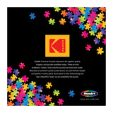 A ROSEART-KODAK PREMIUM-PAPA BEAR SPORTING GOODS-1000 PIECE JIGSAW PUZZLE ad shows colorful puzzle pieces on a black background, with the yellow and red KODAK logo centered and descriptive text underneath.