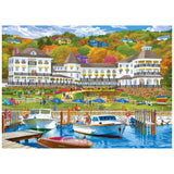 Enjoy assembling the ROSEART-KODAK PREMIUM-LAKE RESORT 1000 PIECE JIGSAW PUZZLE featuring a vibrant lakeside scene with docked boats, a grand white hotel, people relaxing, and colorful autumn trees—perfect for puzzle lovers.