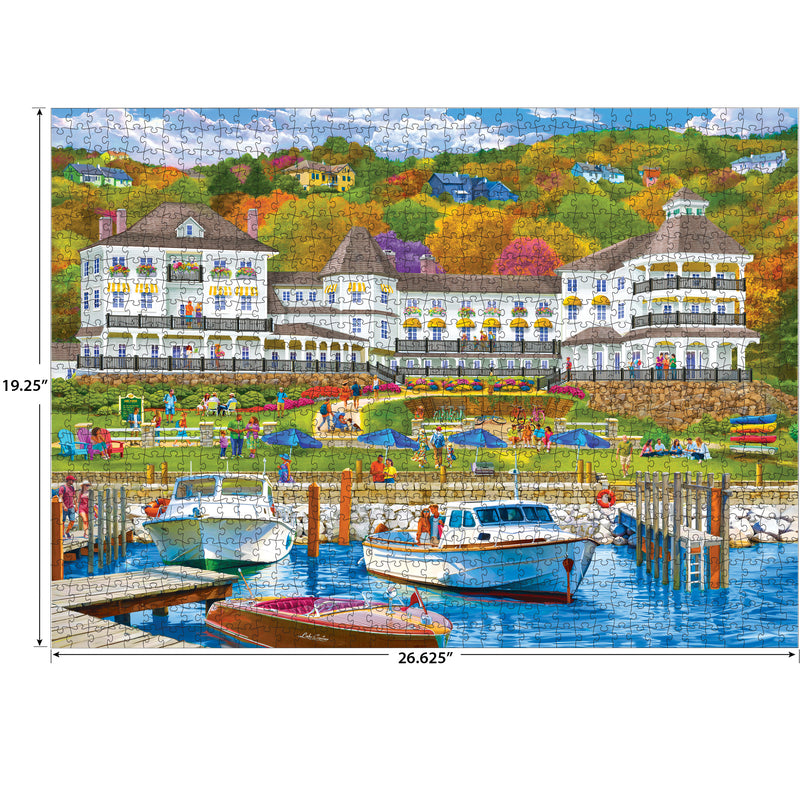 The ROSEART-KODAK PREMIUM Lake Resort 1000 piece jigsaw puzzle depicts a scenic lake resort with boats, people on the lawn, and a grand building on a tree-covered hillside. Dimensions are clearly marked for easy reference.