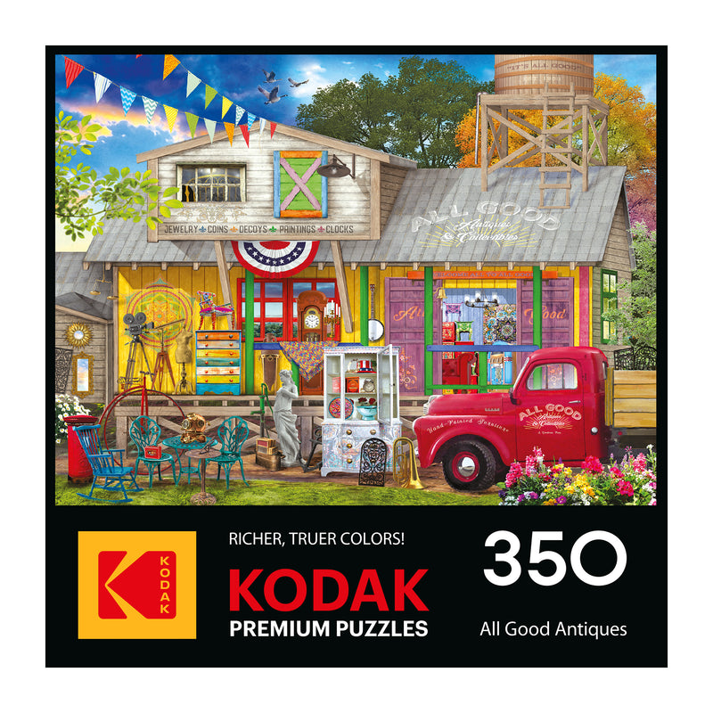 The ROSEART-KODAK PREMIUM "ALL GOOD ANTIQUES" 350 piece jigsaw puzzle box shows a colorful antique shop scene with a red vintage truck.