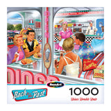 The ROSEART-BACK TO THE PAST-DINER DOUBLE DATE-1000 PIECE JIGSAW PUZZLE showcases a lively 1950s diner scene, perfect for hours of fun assembling its vibrant retro imagery.