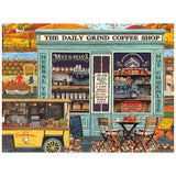 The ROSEART-KODAK PREMIUM-THE DAILY GRIND-350 PIECE JIGSAW PUZZLE showcases an inviting coffee shop scene with outdoor tables, fall decorations, a herbal tea stand, mugs, beans, pastries, and a weekend specials board.