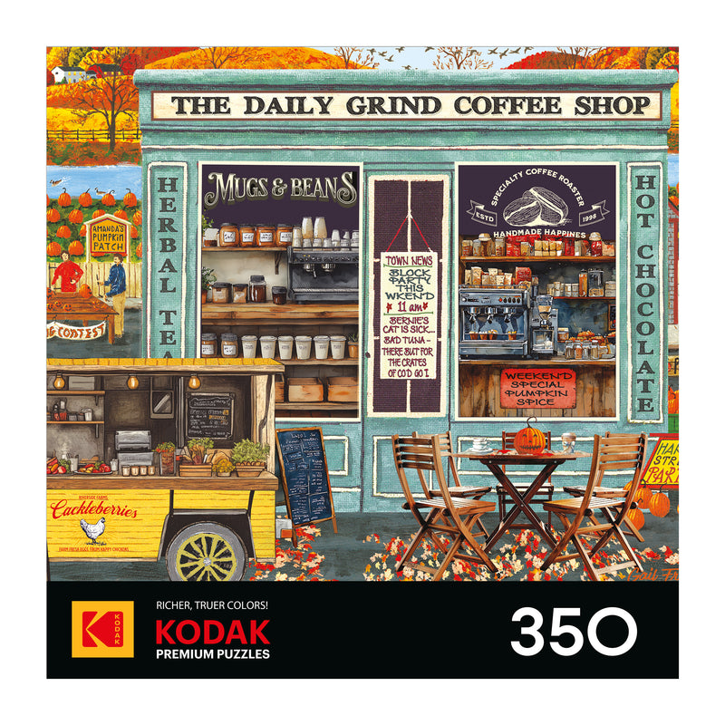 Illustration of a coffee shop with outdoor seating, a food truck, and fall decor featured on the ROSEART-KODAK PREMIUM THE DAILY GRIND 350 piece jigsaw puzzle.