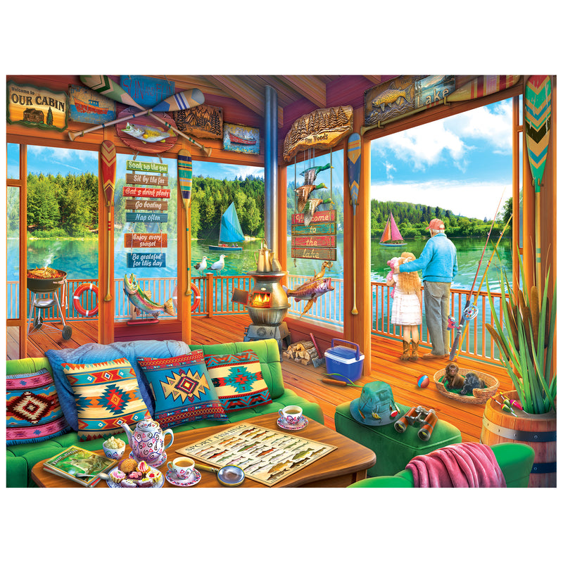 A cozy lakeside cabin with colorful decor, a board game on the table, and an elderly couple overlooking sailboats—just like the ROSEART-KODAK PREMIUM-THE LAKE HOUSE-350 PIECE JIGSAW PUZZLE.