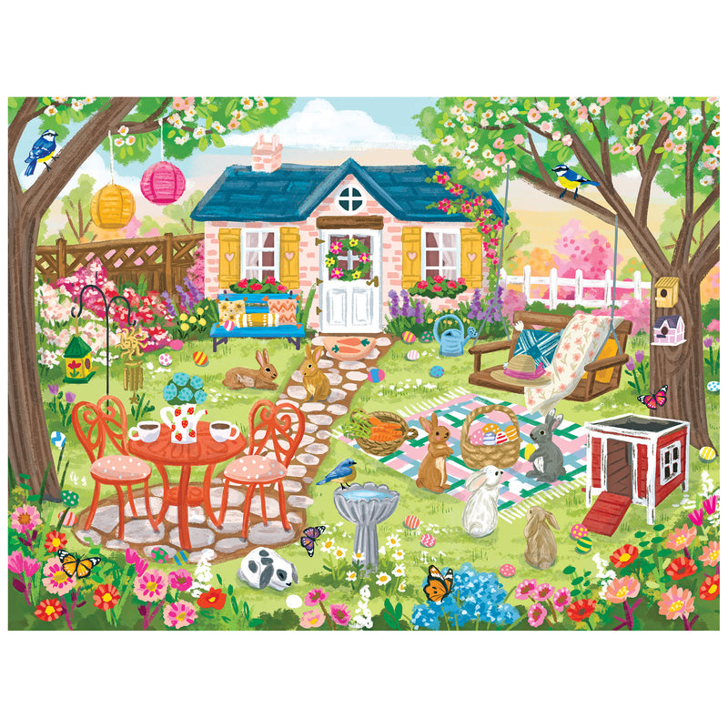 The ROSEART-OLIVIA GIBBS-EASTER GARDEN-300 PIECE JIGSAW PUZZLE features a vibrant Easter garden scene with animals, flowers, a stone path, swing, outdoor furniture with tea settings, and a cottage in the background.