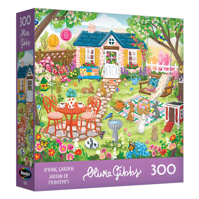 The ROSEART-OLIVIA GIBBS-EASTER GARDEN 300-piece jigsaw puzzle features a vibrant Easter garden with blooming flowers, garden furniture, playful animals, and a charming house in the background.
