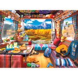 Colorful camper van interior with a table set with food, a guitar, and travel gear. The van door is open, revealing a scenic view of a lake, mountains, and autumn foliage. A dog is laying on the floor.

RoseArt - My Happy Place - Van Life, The Grand Tetons - 750 Piece Jigsaw Puzzle