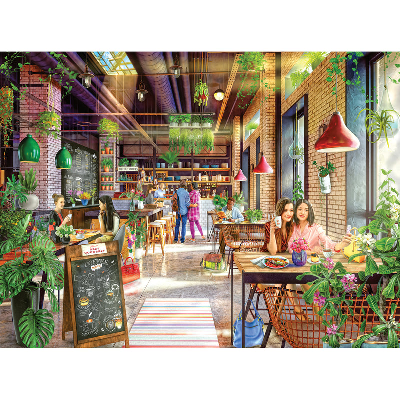 A vibrant cafe with customers dining and interacting, surrounded by lush greenery, colorful decor, and a chalkboard menu stand. The atmosphere is lively and inviting with natural light streaming in. RoseArt - My Happy Place - The Neighborhood Cafe - 750 Piece Jigsaw Puzzle.