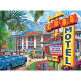 Colorful drawing of Rose Motel with classic cars parked, a family checking in, and signs advertising amenities like air conditioning, family rates, pool, color TV, and free breakfast. Mountains in the background is featured on the RoseArt - Back to the Past - Rose Motel - 1000 Piece Jigsaw Puzzle.