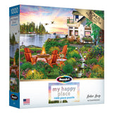 Experience relaxation with the ROSEART "MY HAPPY PLACE - HARBOR HOUSE" 1000-piece jigsaw puzzle, featuring a tranquil lakeside scene with a house, chairs by a fire pit, trees, and a stunning sunset.