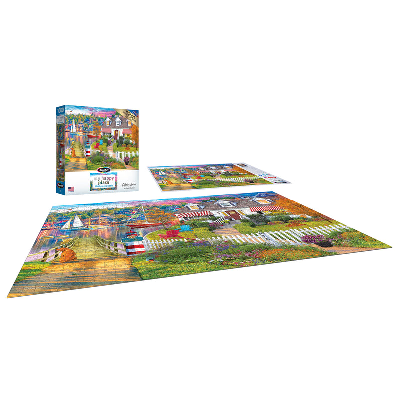 A vibrant scene unfolds with the ROSEART - MY HAPPY PLACE - CHARLES HARBOR- 1000 PIECE JIGSAW PUZZLE, showcasing a charming village. Nearby, the RoseArt box and lid display the matching image of the completed puzzle.