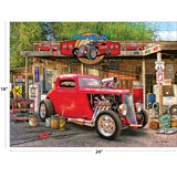 The ROSEART - AMERICAN NOSTALGIA - HOT ROD GAS UP 550 piece jigsaw puzzle features a red hot rod at a vintage gas station with classic signs and oil cans, and measures 18 by 24 inches for a fun, challenging experience.
