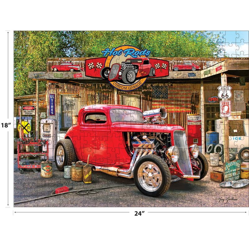 The ROSEART - AMERICAN NOSTALGIA - HOT ROD GAS UP 550 piece jigsaw puzzle features a red hot rod at a vintage gas station with classic signs and oil cans, and measures 18 by 24 inches for a fun, challenging experience.
