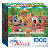 Colorful box of a 1000-piece jigsaw puzzle labeled "RoseArt - Home Country - Farm Country Fair - 1000 Piece Jigsaw Puzzle" depicting a bustling farm county fair. The fair includes animals, carnival rides, food stalls, and crowds of people.
