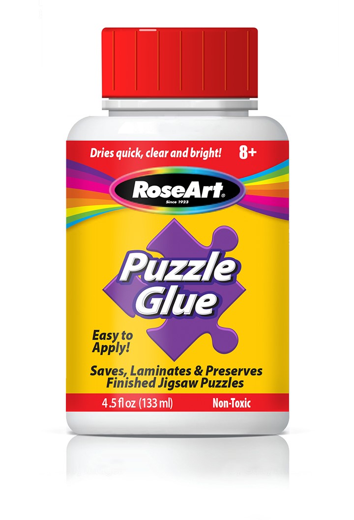 A 4.5 fl oz bottle of RoseArt - 4.5 oz Puzzle Glue 6 pack with a red cap. Promotes quick drying, clarity, and brightness. Suitable for ages 8 and up.