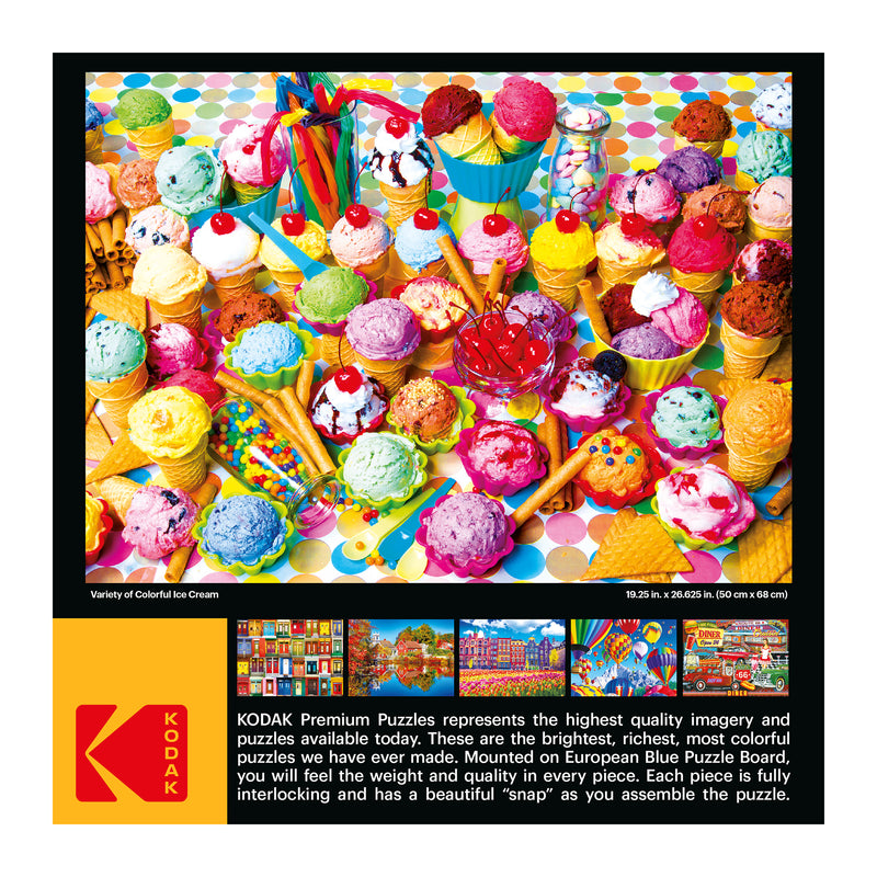 A brightly colored jigsaw puzzle image featuring an assortment of ice cream scoops in cones and bowls, surrounded by various toppings and sweets. Text and brand logo appear below the puzzle image. RoseArt - Kodak Premium - Variety of Colorful Ice Cream - 1000 Piece Jigsaw Puzzle.