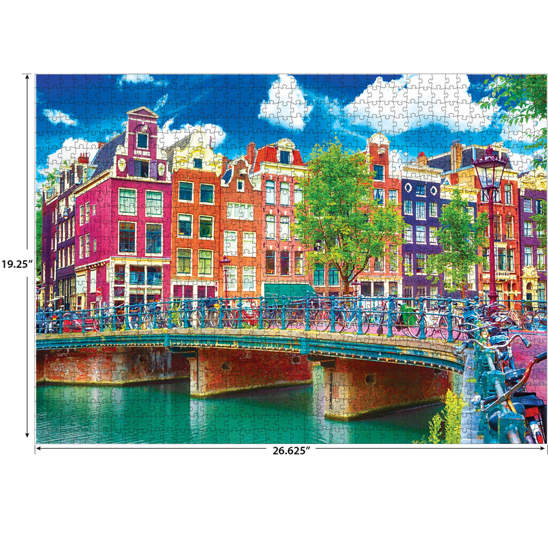 A RoseArt - Kodak Premium - Colorful Waterfront Buildings, Amsterdam - 1000 Piece Jigsaw Puzzle depicting a colorful row of buildings along a canal in Amsterdam, with a bridge in the foreground.
