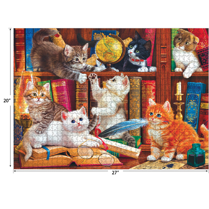 A **RoseArt - Kodak Premium - Library Mischief - 1000 Piece Jigsaw Puzzle** featuring kittens playing with various items in a library setting. The dimensions of the completed puzzle are 20 inches by 27 inches.