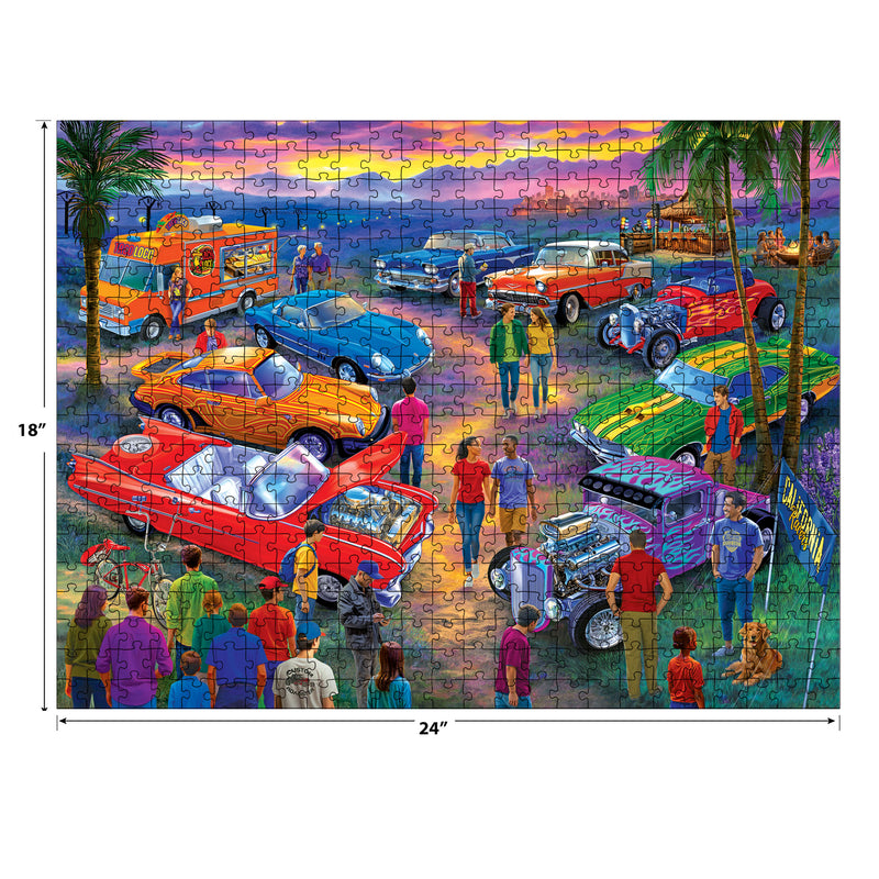 The ROSEART - BIGELOW ILLUSTRATIONS jigsaw puzzle depicts a lively California Car Show at sunset with classic cars, palm trees, people mingling, a friendly dog, and a bustling food truck. The completed puzzle measures 18x24 inches.