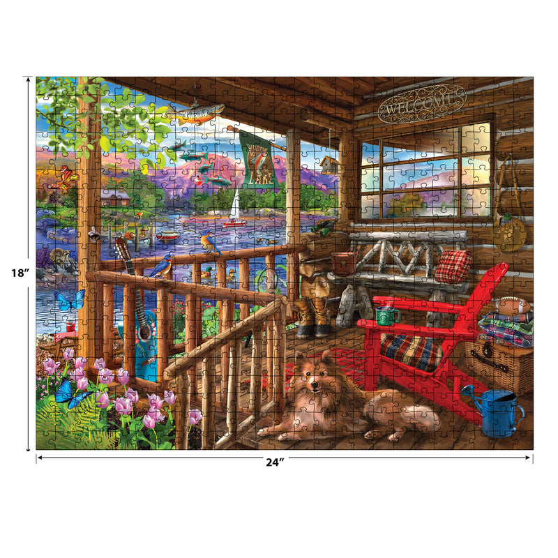 Enjoy the essence of porch life with the ROSEART - BIGELOW ILLUSTRATIONS - PORCH LIFE 500-piece jigsaw puzzle, featuring a tranquil lakeside cabin scene with a dog, red chair, blooming flowers, and sailboats. Dimensions: 24" x 18".