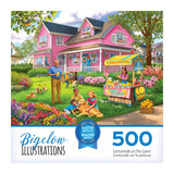 The ROSEART - BIGELOW ILLUSTRATIONS - LEMONADE ON THE LAWN 500-piece jigsaw puzzle showcases a colorful scene with a pink house and lemonade stand, where kids play and adults enjoy garden flowers.