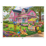 Discover the charming 500-piece "Lemonade on the Lawn" jigsaw puzzle by Bigelow Illustrations. Featuring a delightful scene of a family, dogs, and a lemonade stand near a pink house, this 24x18-inch puzzle from ROSEART offers hours of creative fun.