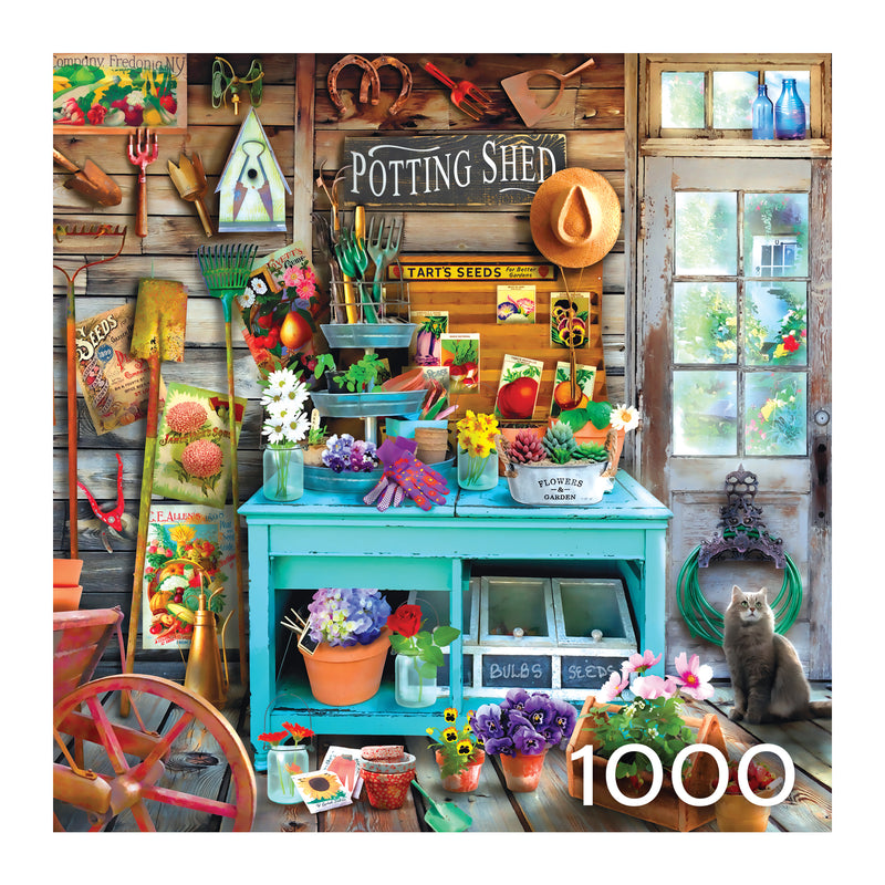 The ROSEART - HOBBY HAVEN - THE POTTING SHED - 1000 PIECE JIGSAW PUZZLE depicts a colorful potting shed with gardening tools, seeds, and flowers on a turquoise workbench. A gray cat rests on the floor as decorative items enhance the wooden wall.