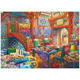 A cozy room brimming with colorful quilts, patchwork items, a wooden staircase, chairs, books, and a sleeping cat evokes the scene of ROSEART's HOBBY HAVEN - QUILT SHOP 1000 PIECE JIGSAW PUZZLE.