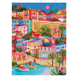 The ROSEART - MILLIE ILLUSTRATES - MARSEILLE 300 PIECE JIGSAW PUZZLE showcases a vibrant illustration of Marseille, with colorful buildings, lush greenery, swaying boats, and a bright pink moon, capturing the town's charm like piecing together a vivid masterpiece.