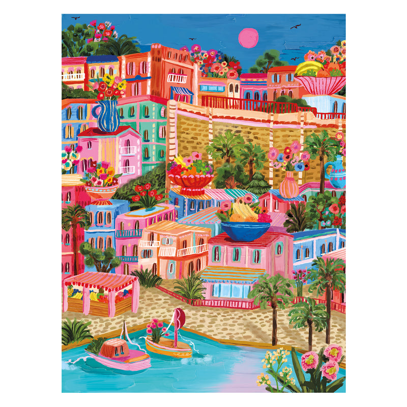 The ROSEART - MILLIE ILLUSTRATES - MARSEILLE 300 PIECE JIGSAW PUZZLE showcases a vibrant illustration of Marseille, with colorful buildings, lush greenery, swaying boats, and a bright pink moon, capturing the town's charm like piecing together a vivid masterpiece.