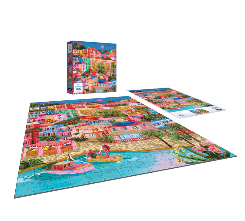 Discover the Roseart 300-piece jigsaw puzzle, featuring Millie Illustrates' vibrant Marseille coastal town with boats, houses, and palm trees. Includes completed puzzle, box, and reference image for your enjoyment.