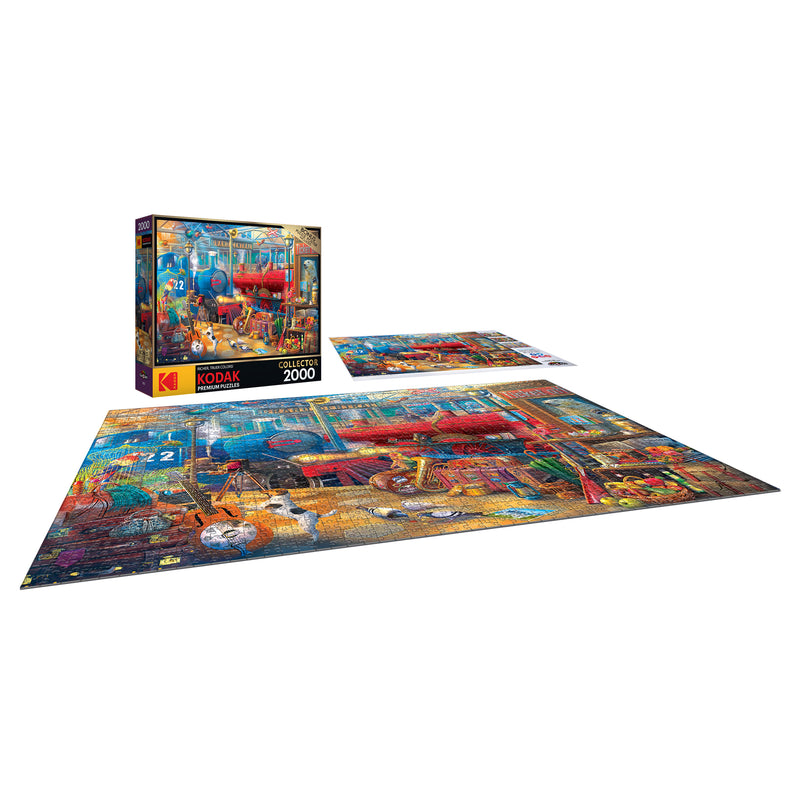 A completed 2000-piece RoseArt - Kodak Collector - Train Station - jigsaw puzzle featuring a vibrant and colorful image of a retro-themed scene, with its original packaging and an accompanying picture guide.