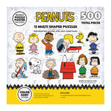 A **RoseArt - Peanuts 12 Multi-Shaped - Peanuts - 500 Piece Jigsaw Puzzle** box featuring Peanuts characters. The box highlights 12 multi-shaped puzzles with color-coded backs and includes a bonus puzzle poster.