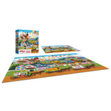 A completed RoseArt 1000-piece jigsaw puzzle titled "Kellogg's - Town by the Sea," showcasing vintage Kellogg's delivery wagons, is displayed alongside its box and an additional view of the puzzle.