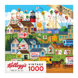 A RoseArt - Kellogg's - Town by the Sea - 1000 Piece Jigsaw Puzzle featuring Kellogg's vintage cereal ads in a seaside town scene with buildings, a lighthouse, and a horse-drawn wagon. Box also mentions a bonus puzzle poster included.