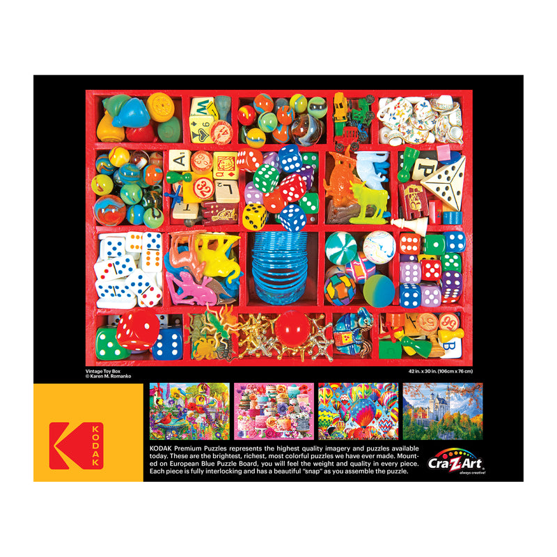 Image of a RoseArt - Kodak Premium - Vintage Toy Box - 3000 Piece Jigsaw Puzzle featuring a vibrant assortment of colorful toys and objects in a grid layout. The puzzle is by Cra-Z-Art with a listed size of 42.5 cm x 30.5 cm and 1000 pieces.