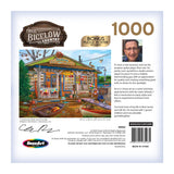 A 1000-piece RoseArt - Chris Bigelow - Castaway Bait and Tackle - 1000 Piece Jigsaw Puzzle box features an image of a colorful bait and tackle shop with various items outside. The box includes the artist's information and a photo. Puzzle size is 27"x20" (69cm x 51cm).
