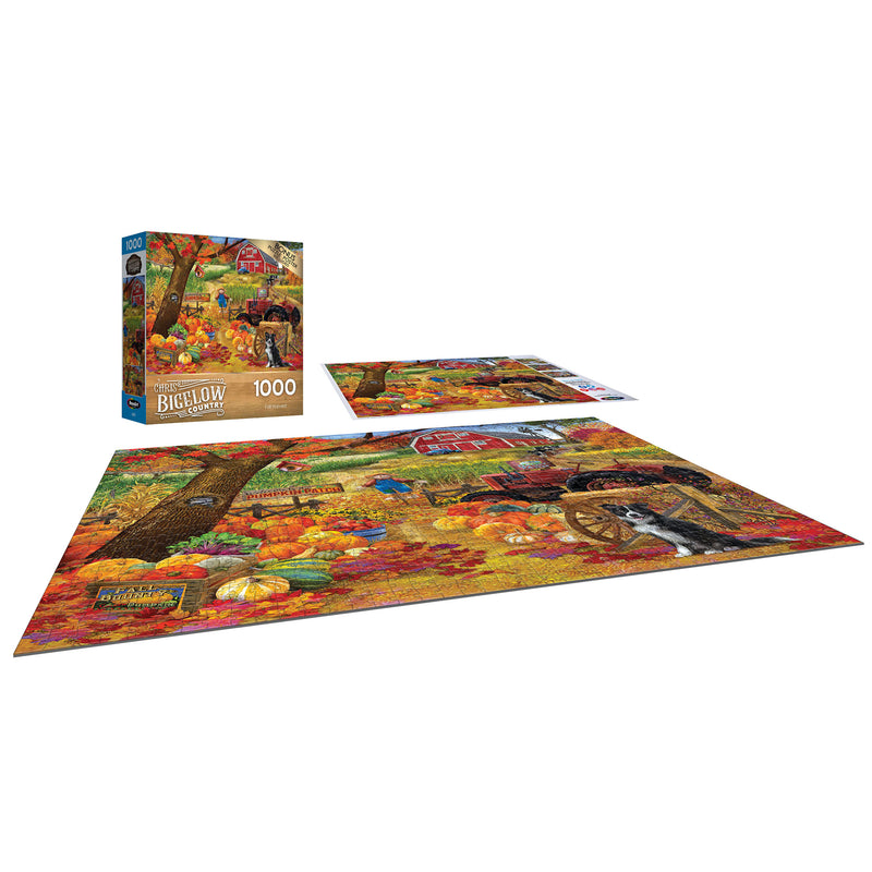 A 1000-piece jigsaw puzzle featuring a colorful autumn farm scene with pumpkins. The RoseArt - Chris Bigelow - Fall Harvest - 1000 Piece Jigsaw Puzzle box is displayed upright and also laid out in completed form next to the pieces.