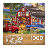 A 1000-piece puzzle box featuring a lively barn dance scene with a red barn, dancers inside, a red truck, and farm animals in the foreground is called the RoseArt - Chris Bigelow - The Barn Dance - 1000 Piece Jigsaw Puzzle.